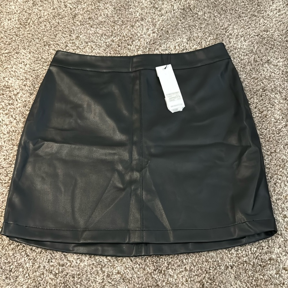 BB Dakota black faux leather mini skirt. Size 4. Brand new with tags